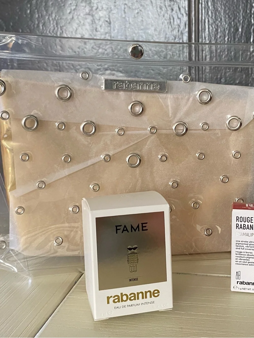 Rabanne Clear Studded Pouch with gold inner
